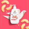 imageDove Advanced Care Hand Wash Peach ampamp Rice Milk 4 Count for Washing Away Dirt ampamp Germs While Nourishing Skin 10 Layers Deep with Moisture Boost 5X Complex